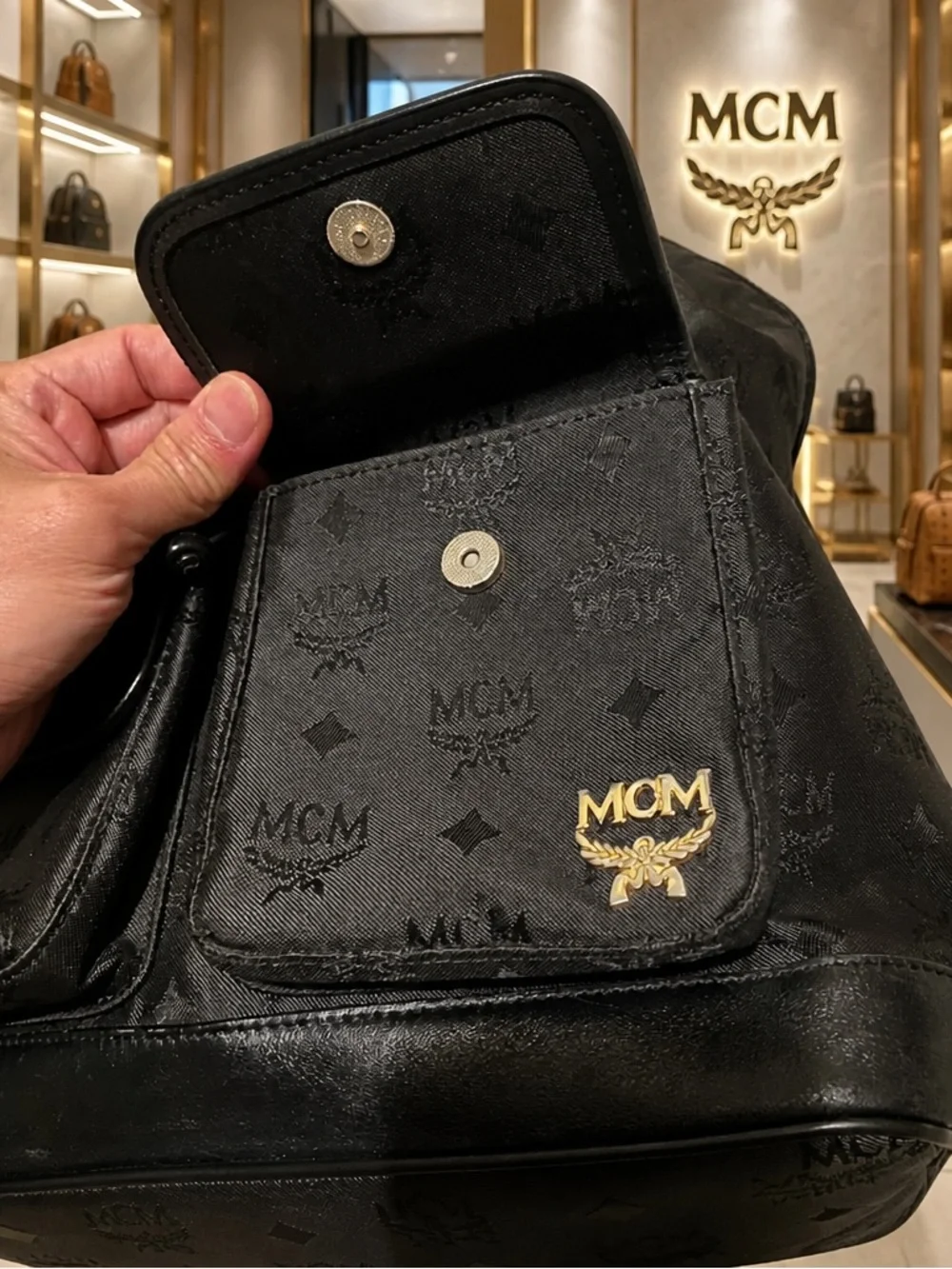 MCM Black Monogram Backpack with Gold-Plated Detail